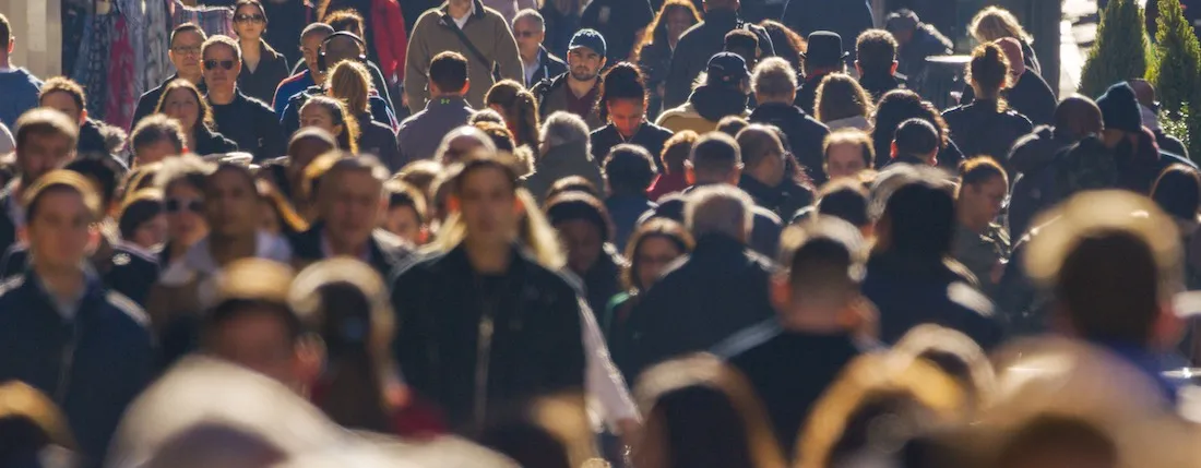 Photograph showing busy street with people
